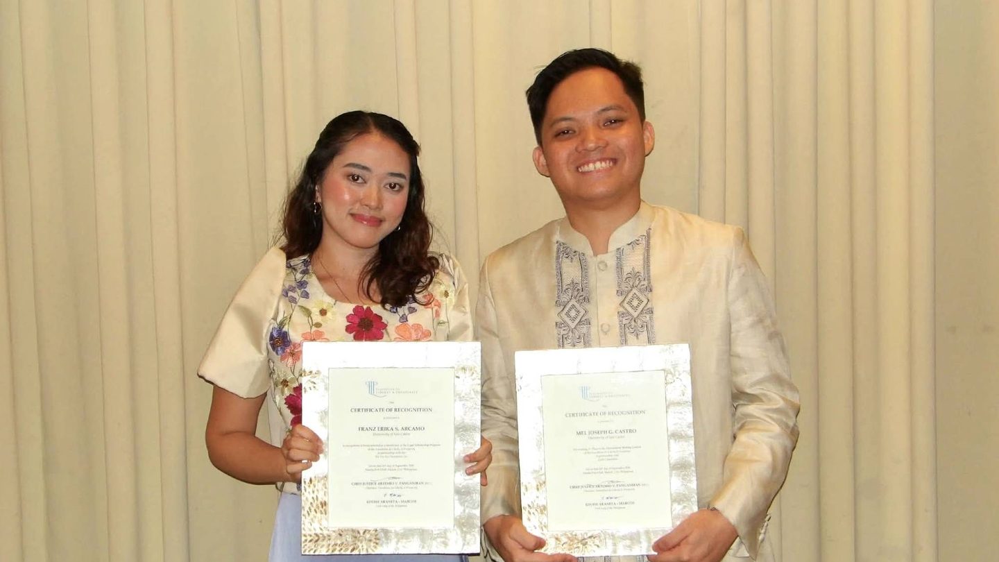 Franz Erika Arcamo and Mel Joseph G. Castro holding their certificates of recognition from the Foundation for Liberty and Prosperity, 16 September 2026